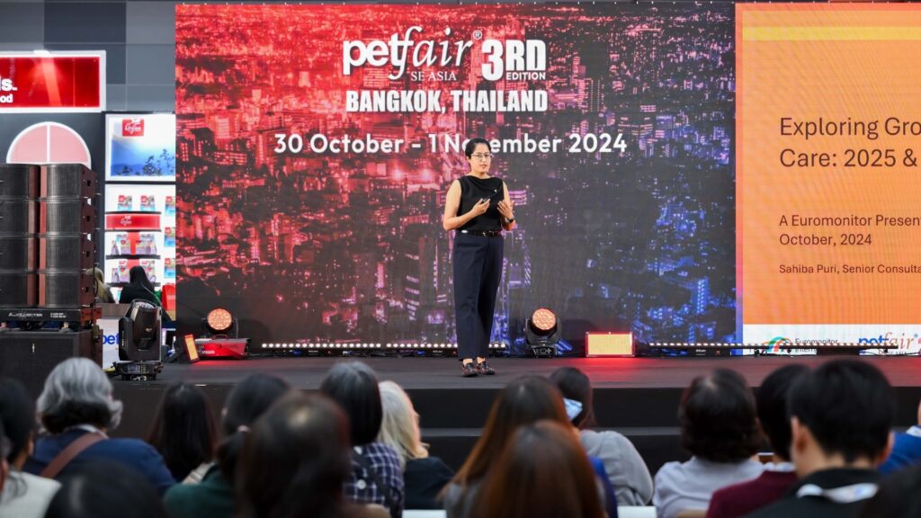 Speaker on a stage at Pet Fair South East Asia